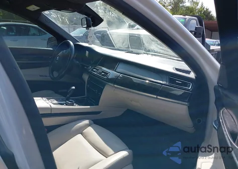 2015 BMW 750Li z USA, uszkodzony, nr VIN WBAYE8C52FD781788